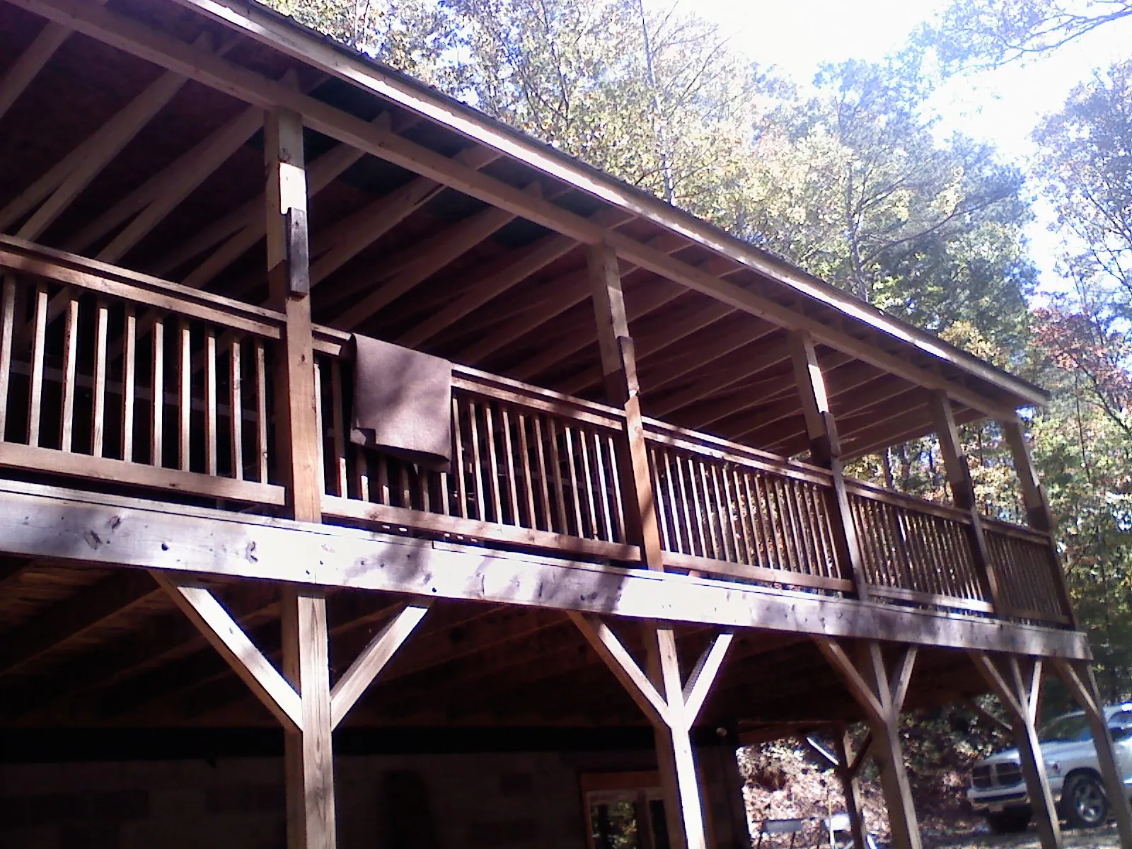 Timber framing under a new elevated porch and deck — Roof Leak Repair in Holly by Roofing Brothers